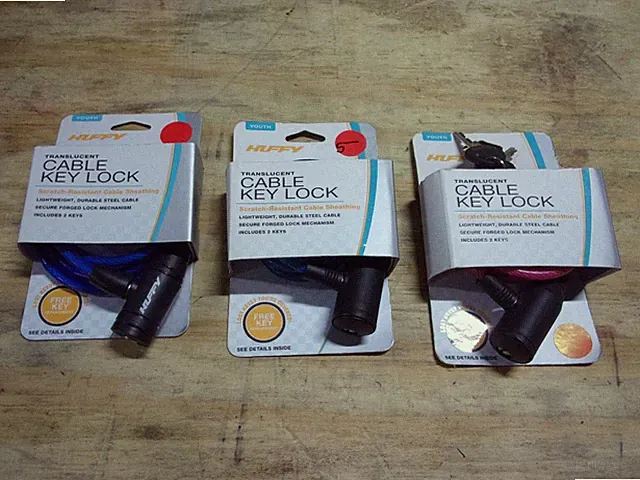 3 NEW HUFFY BRAND LOCKING CABLES FOR BIKES, ETC. KEYED LOCKS.